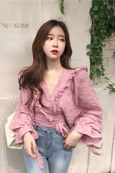 Blusa informal de gasa transparente con volantes